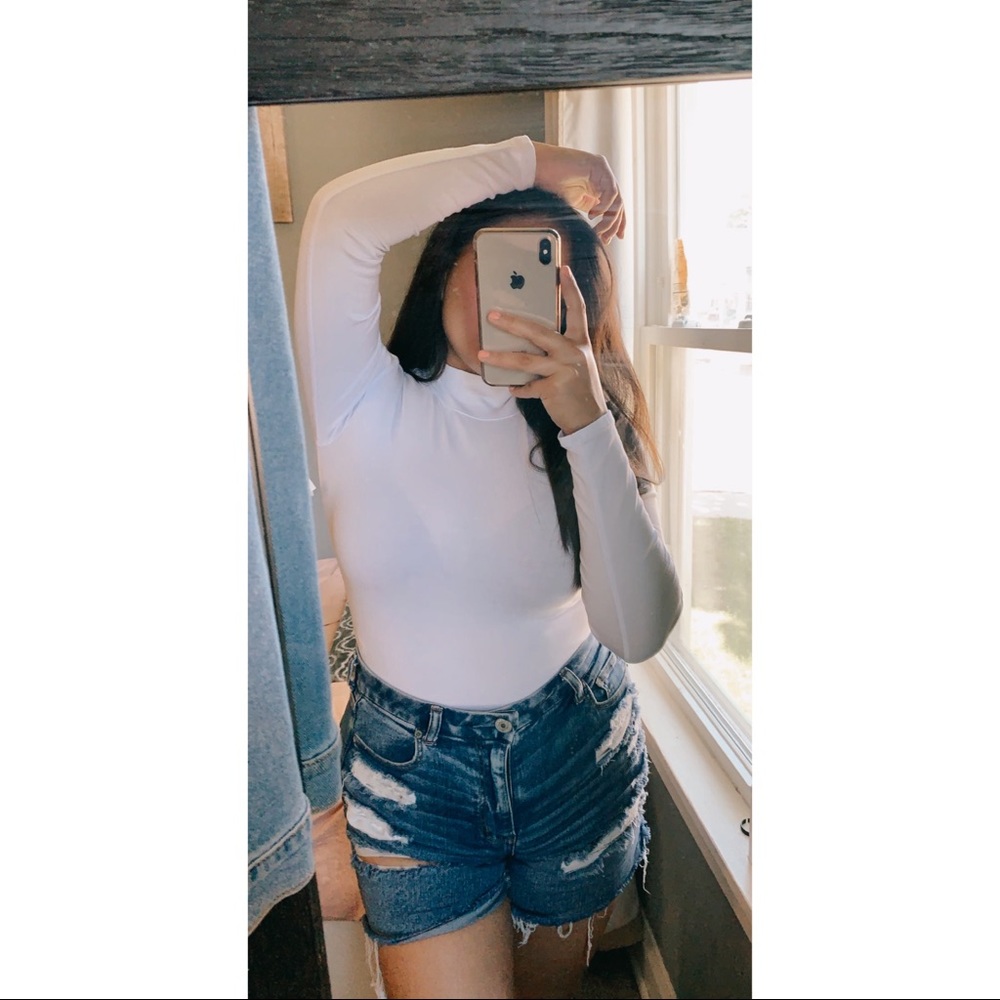 White turtleneck bodysuit